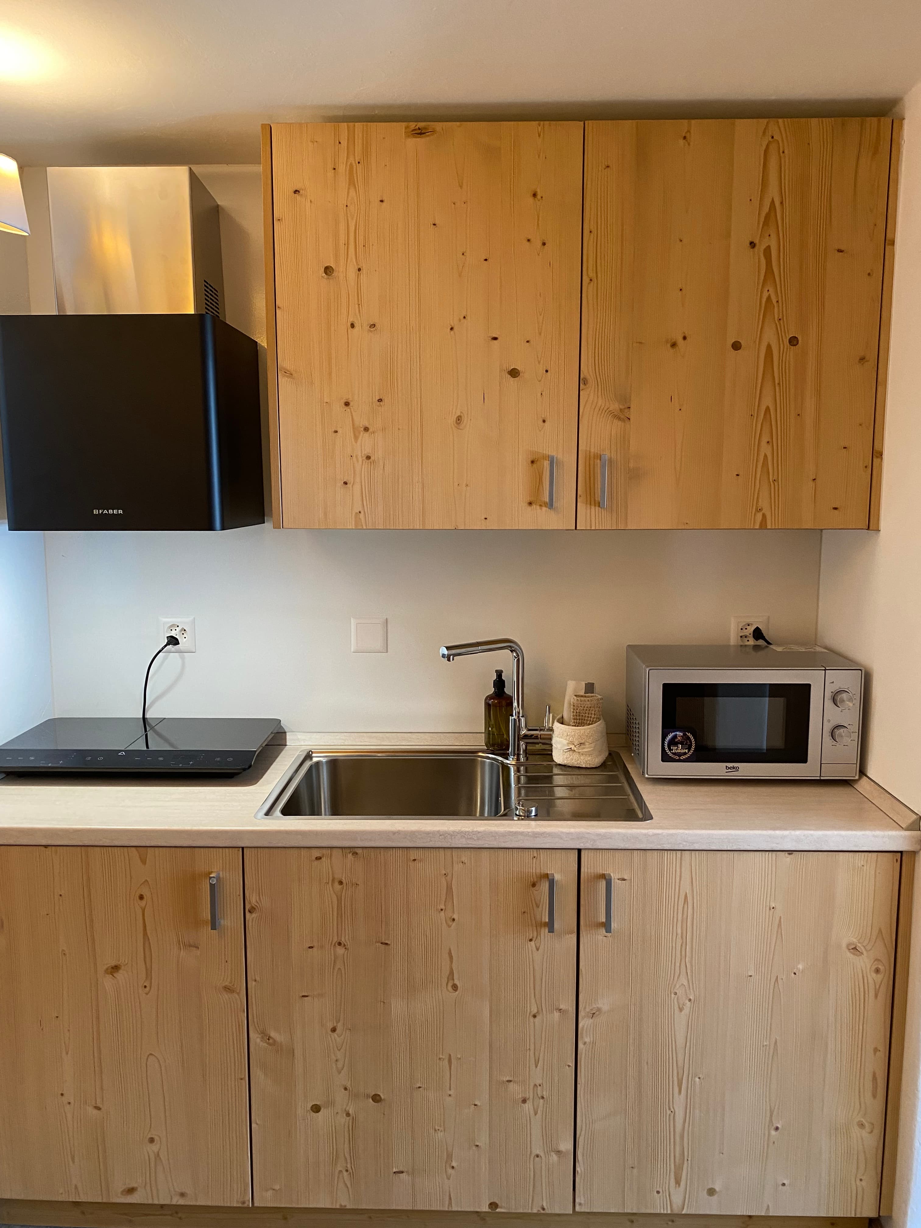 Kitchenette with induction hob